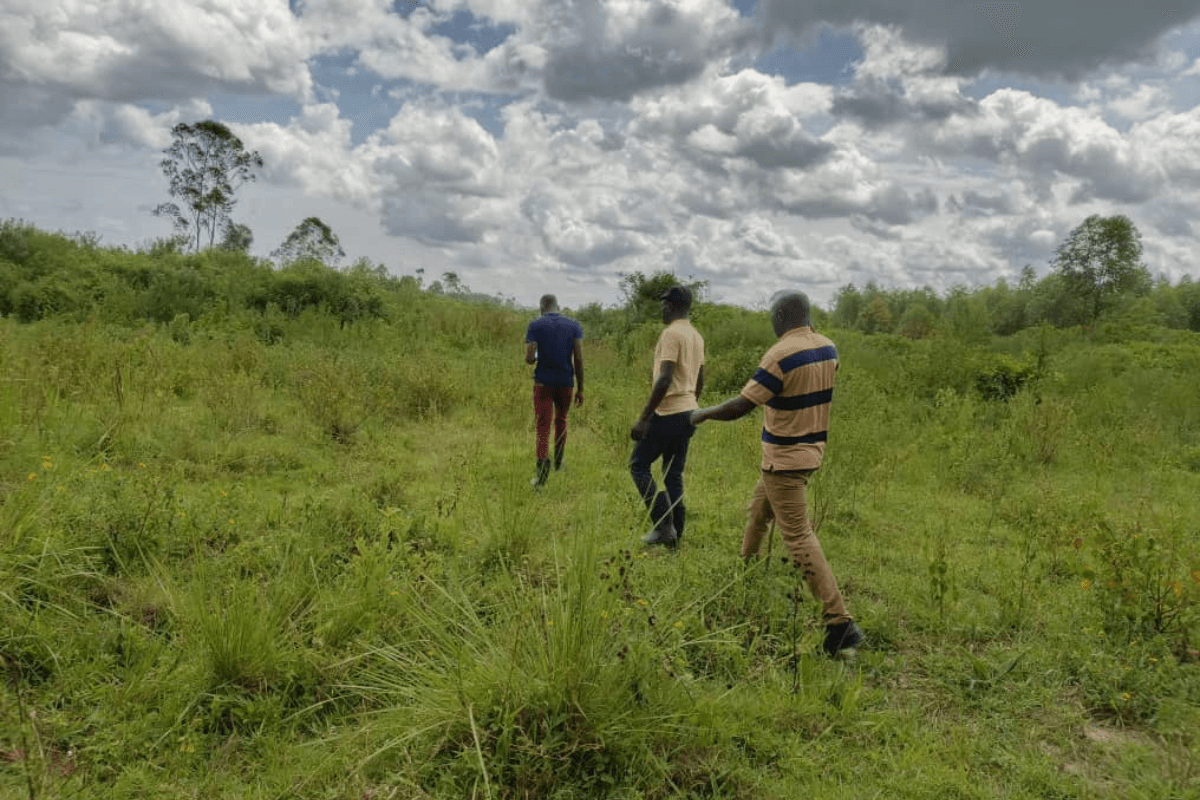 KAASO staff members surveying the land, December 2024